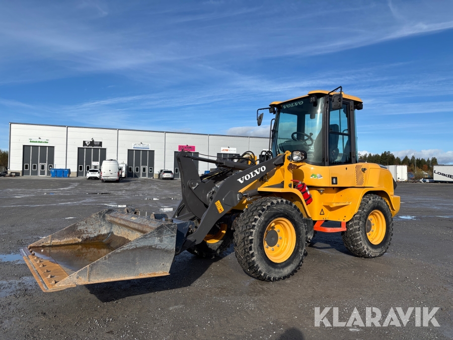 Hjullastare Volvo L30G med planeringsskopa & gafflar