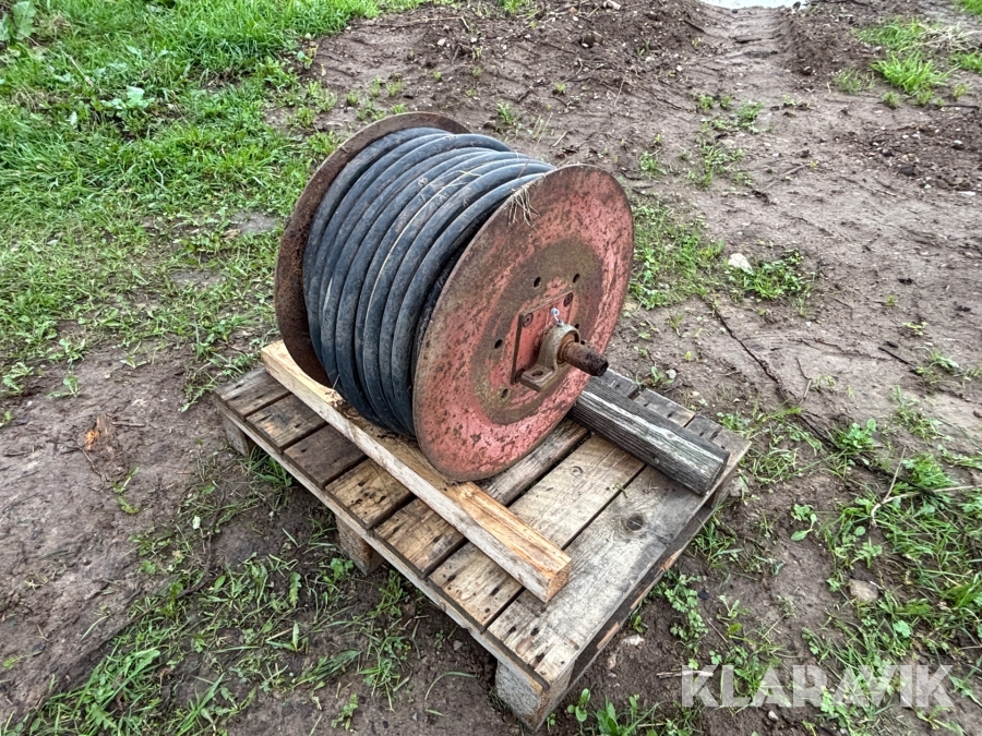 Spolslang på hydraulisk slangvinda