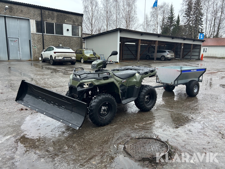 Fyrhjuling Polaris Sportsman 570 med plog och gårdsvagn