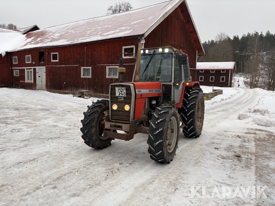 Traktor Massey Ferguson 699 -86 med Holms plogblad
