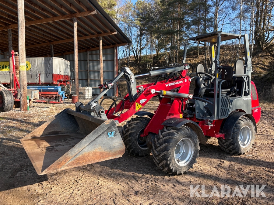 Kompaktlastare Weidemann 1280 med skopa