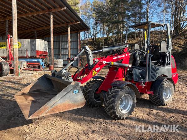 Kompaktlastare Weidemann 1280 med skopa