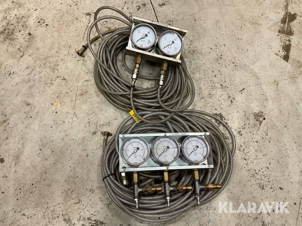 Lufttrycksmätare med slang