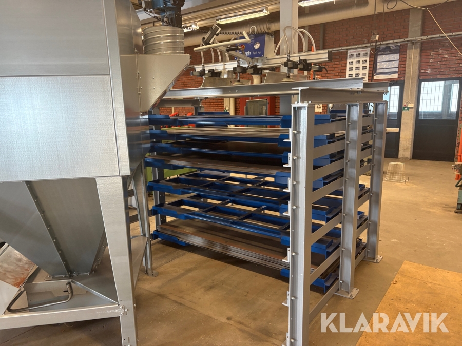 Plåtställage med vakuumliftredskap