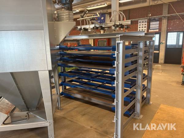 Plåtställage med vakuumliftredskap