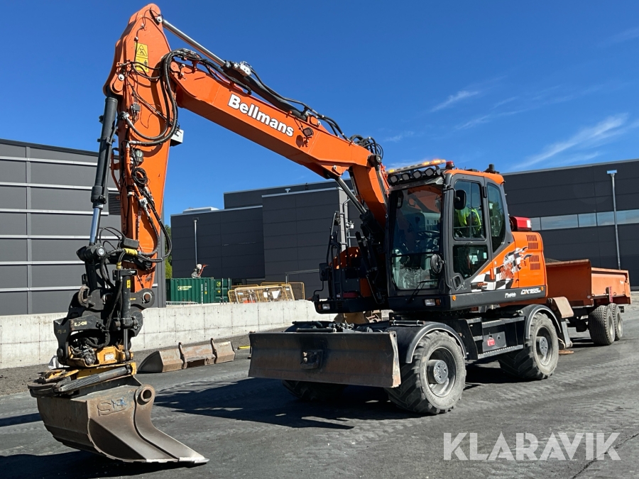 Hjulgrävare Doosan DX165W med 3D grävsystem, tiltrotator, redskap och vagn