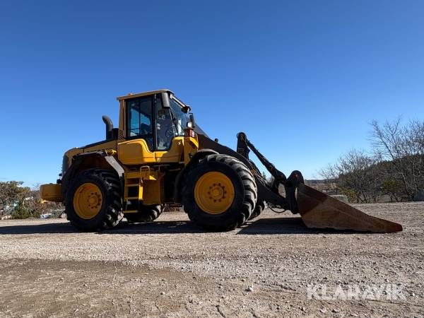 Hjullastare Volvo L60F med planerskopa