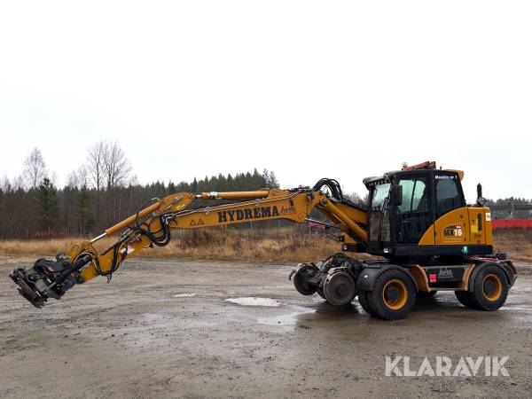 Hjulgrävare Hydrema MX16 RAIL med Oilquick