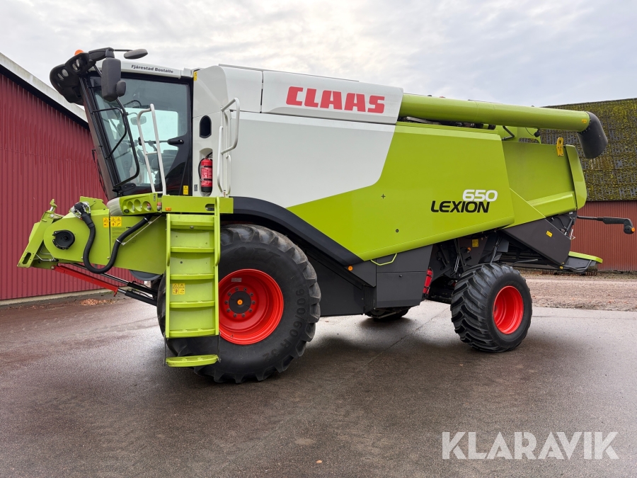 Skördetröska Claas Lexion 650 med V770 Skärbord på vagn