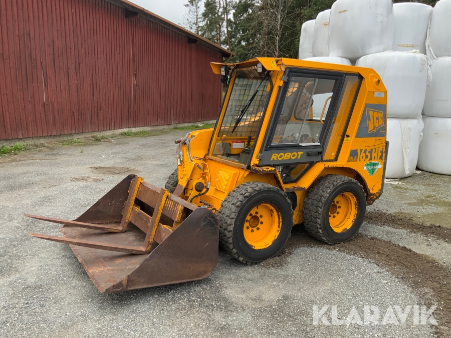 Kompaktlastare JCB 165 HF Robot med skopa och gafflar