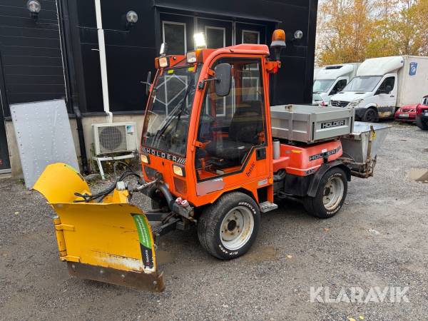 Redskapsbärare Holder C 2.34 med Vikplog och Sandspridare
