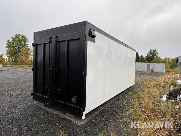 Container på lastväxlarflak med öppningsbar sida
