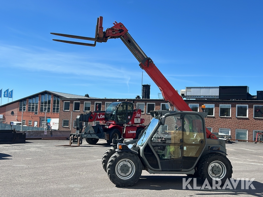 Teleskoplastare Merlo P25.6 med manuella gafflar