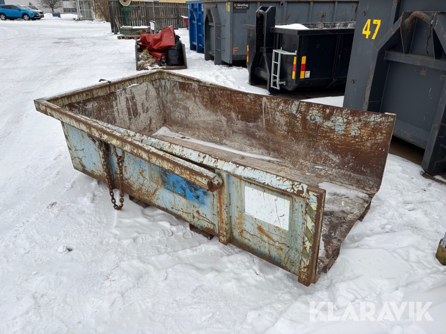 Självtömmande materialsloda