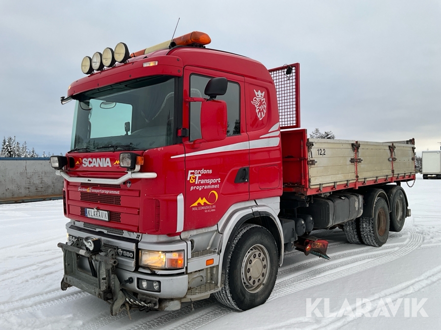 Lastbil Scania R164 plogutrustad