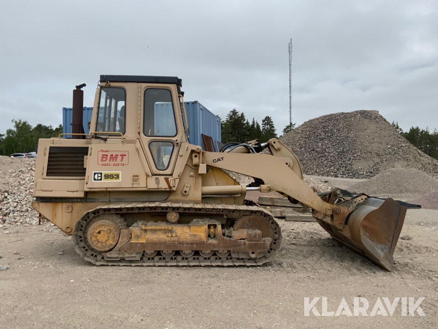 Bandlastare Caterpillar C953 med skopa