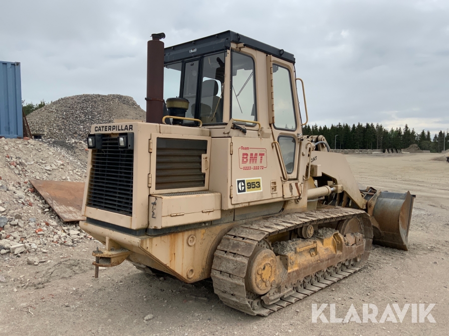 Bandlastare Caterpillar C953 med skopa