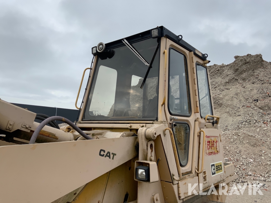 Bandlastare Caterpillar C953 med skopa