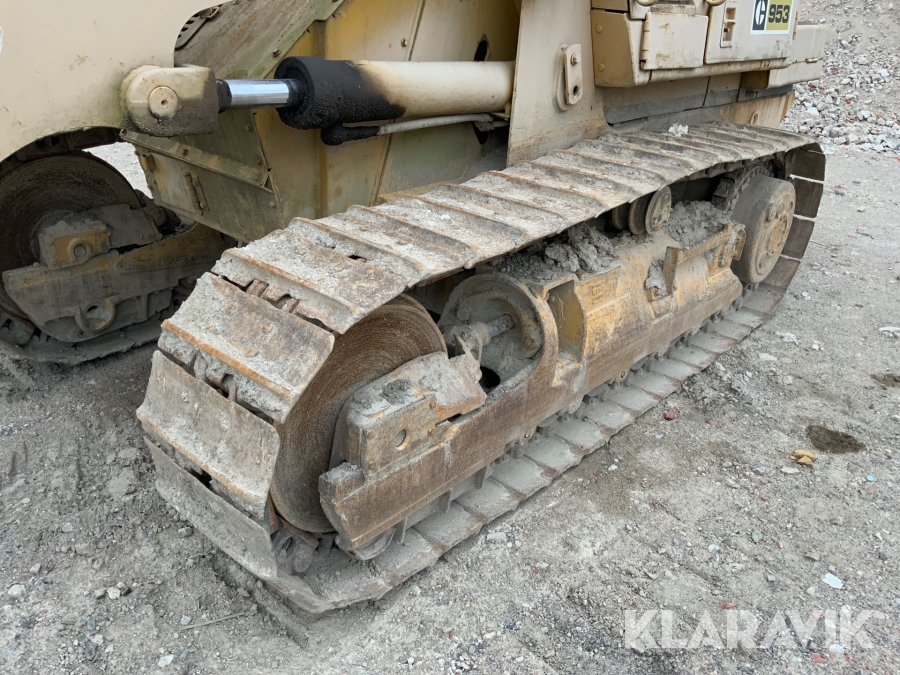 Bandlastare Caterpillar C953 med skopa