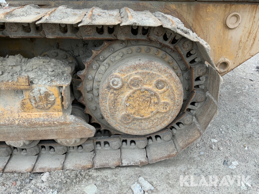 Bandlastare Caterpillar C953 med skopa