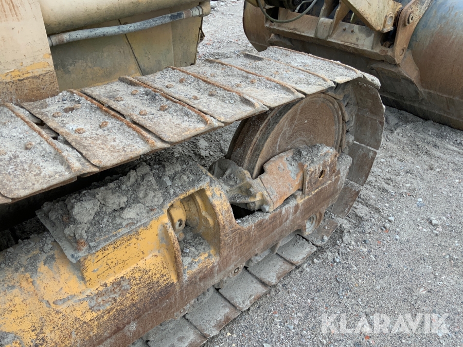 Bandlastare Caterpillar C953 med skopa