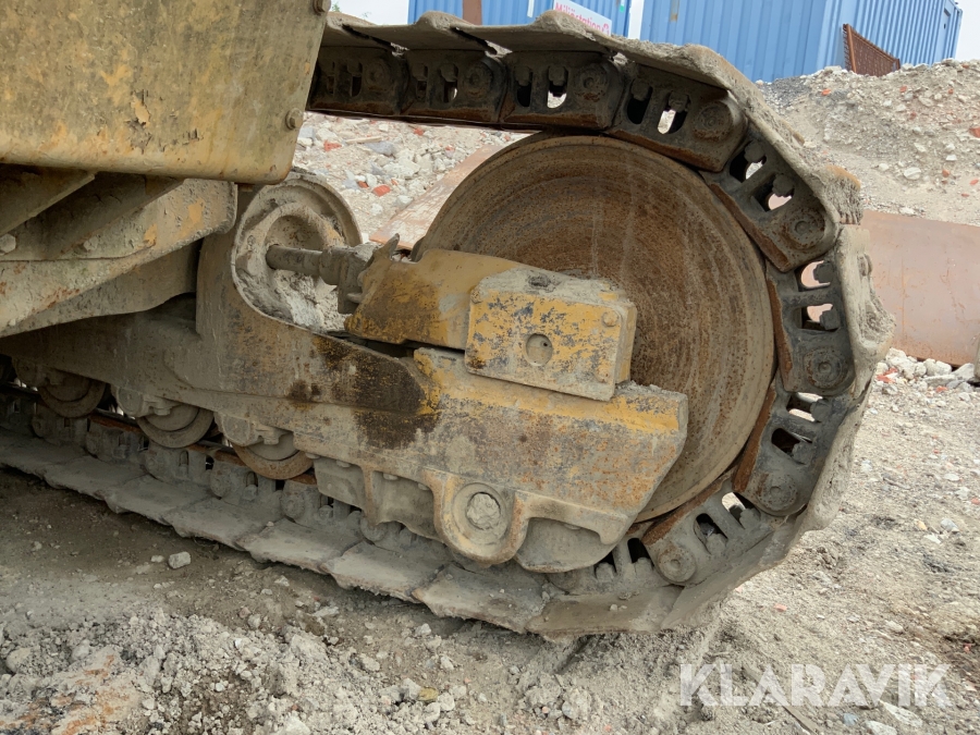 Bandlastare Caterpillar C953 med skopa