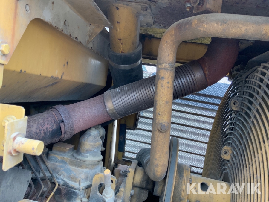 Bandlastare Caterpillar C953 med skopa