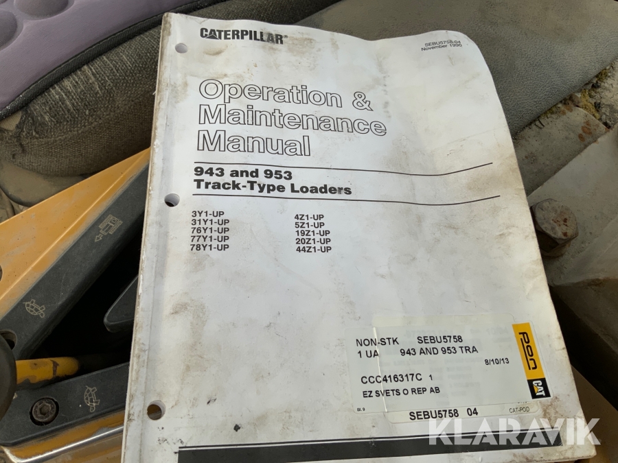 Bandlastare Caterpillar C953 med skopa