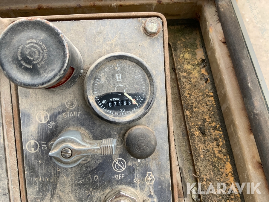 Bandlastare Caterpillar C953 med skopa