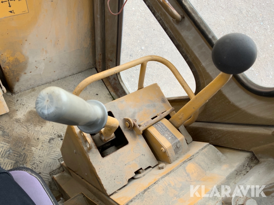 Bandlastare Caterpillar C953 med skopa