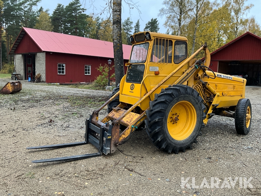 Baklastare Volvo BM 218 TD med skopa och gafflar