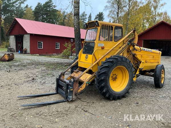 Baklastare Volvo BM 218 TD med skopa och gafflar