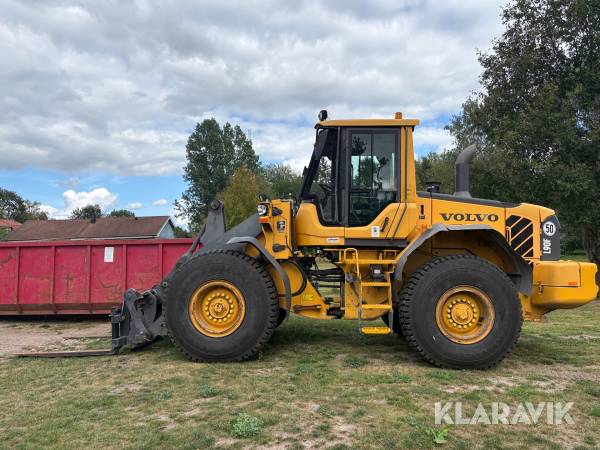 Hjullastare Volvo L90F med gafflar och skopa