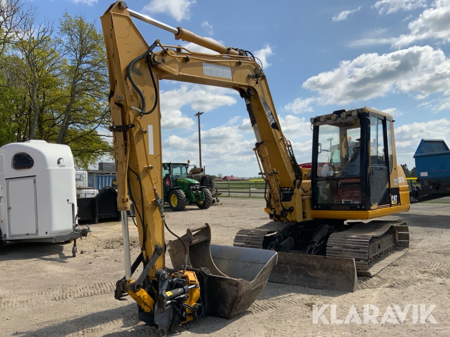 Grävmaskin CAT 307B med rotor och skopor