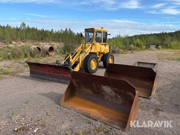 Hjullastare Caterpillar 910 med tillbehör