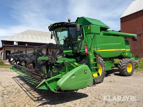 Skördetröska John Deere W550 4WD med 20 fots skärbord och GPS