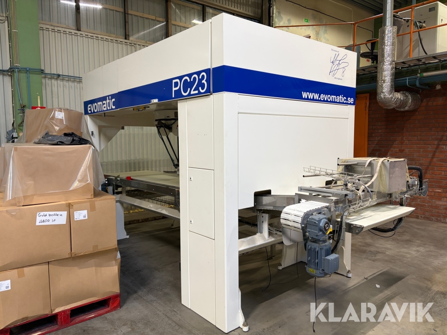 Robotiserad packcell Evomatic PC 23 med ABB robotplock