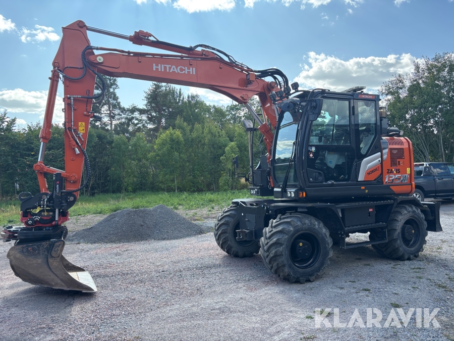 Grävmaskin Hitachi ZX135-w7 med kärra och redskap