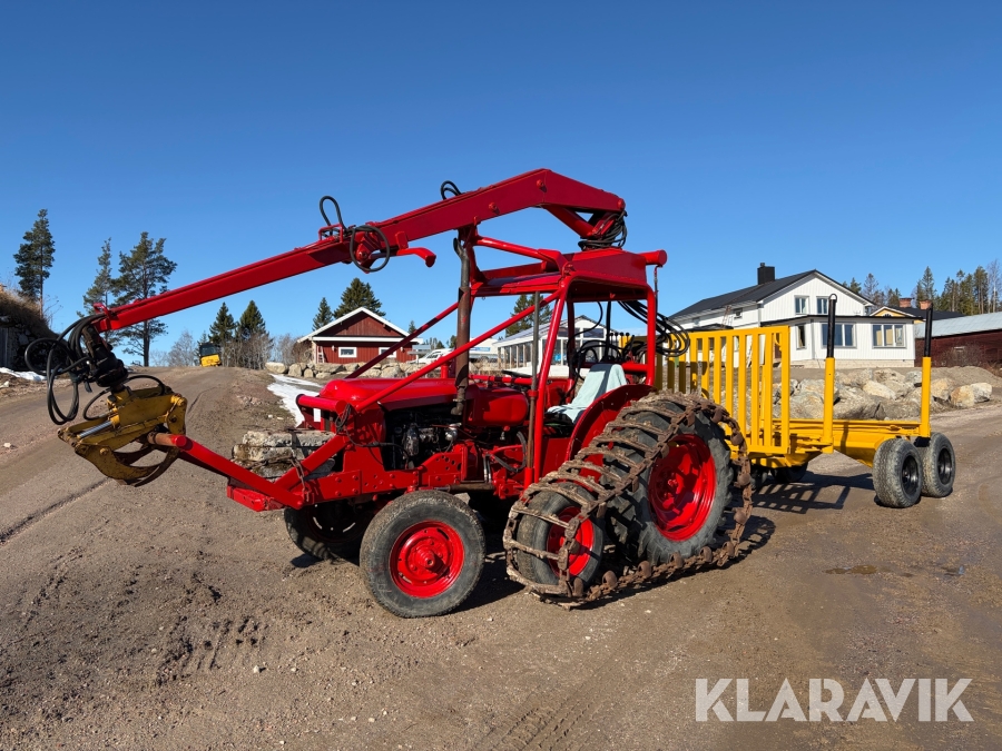 Halvbandare Volvo BM med kran och vagn