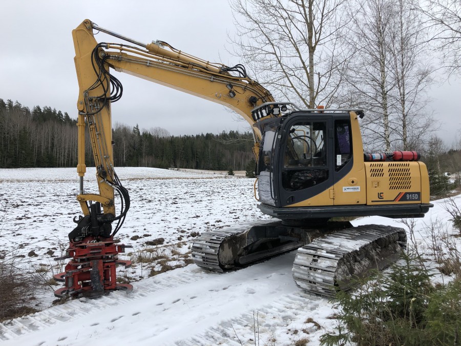 Bandgrävmaskin med tillbehör 