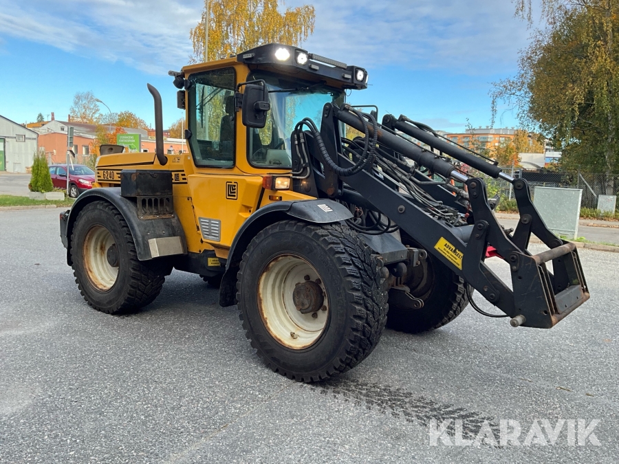 Hjullastare Lundberg 6240 med vikplog sandspridare och snöslunga