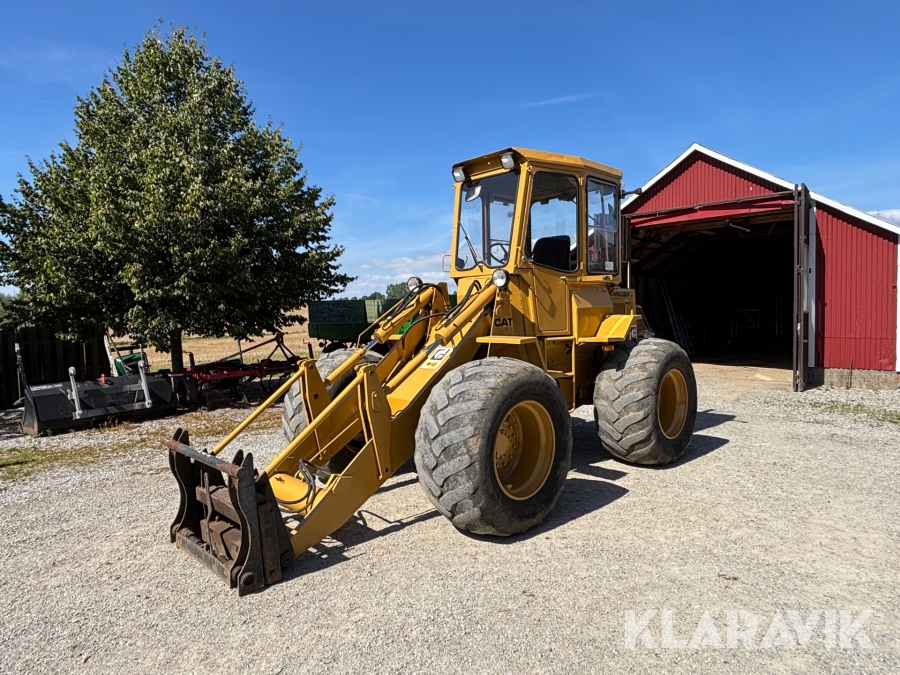 Hjullastare CAT 910 med skopa