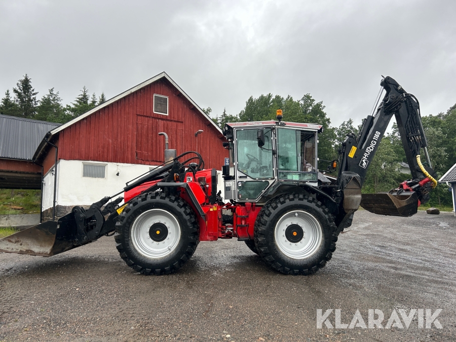 Traktorgrävare Huddig 1160 med flera redskap