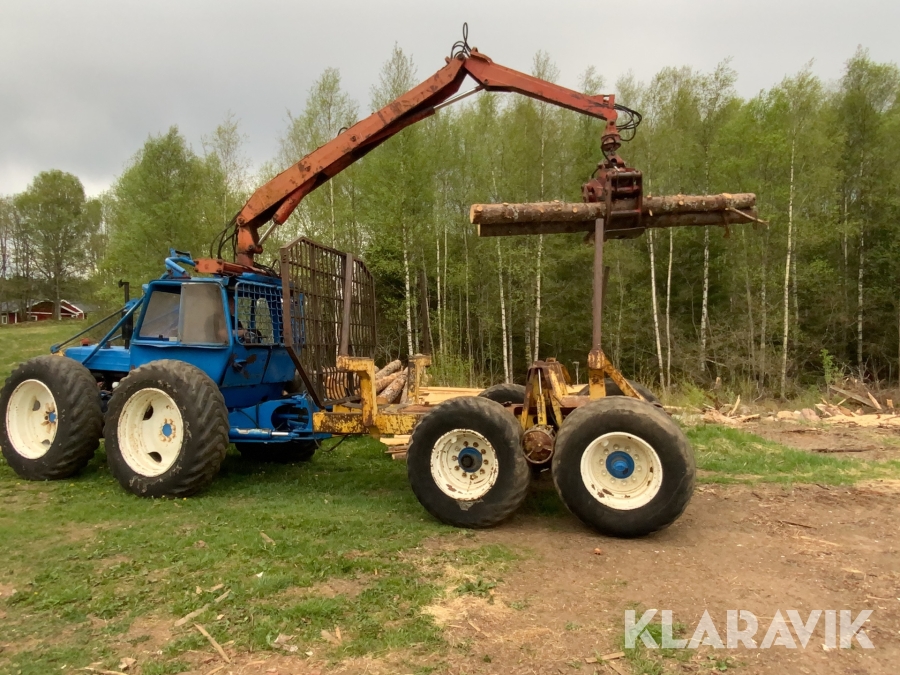 Skogsekipage Ford County 5000 med fast monterad vagn, midjestyrd, drift och vinsch