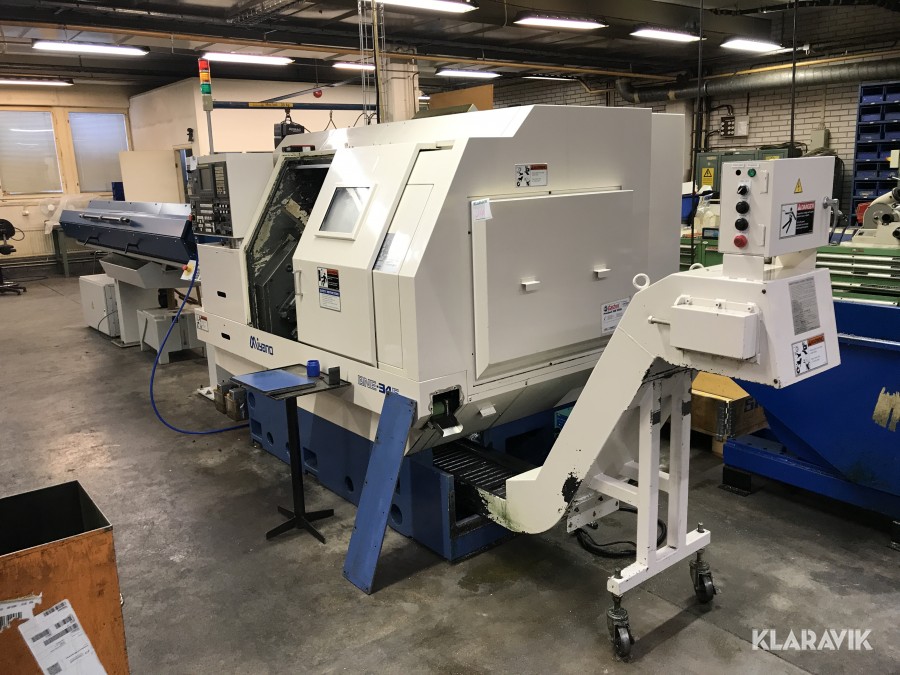 CNC-svarv med stångmagasin 