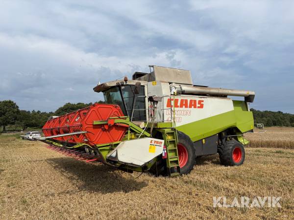 Skördetröska Claas Lexion 460 med 25 fots C750 auto-contour bord