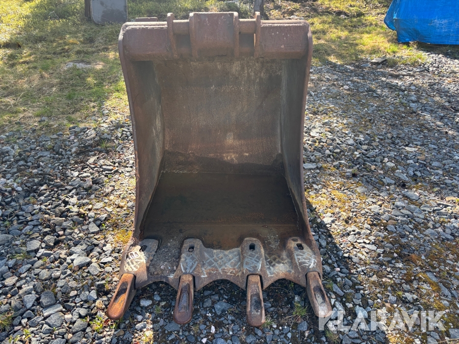 Tandad grävskopa