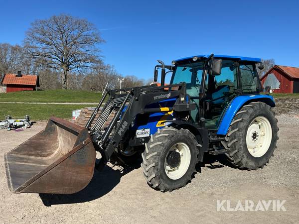 Traktor New Holland T5040 skogsutrustad med lastare