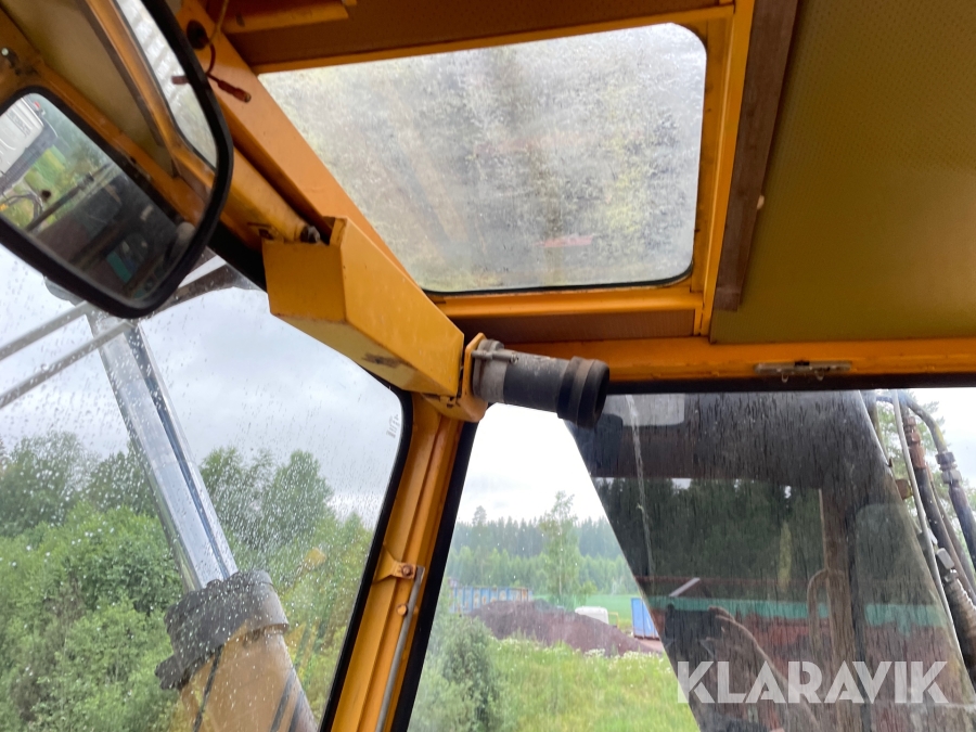Grävmaskin Åkerman H7B med maskintrailer
