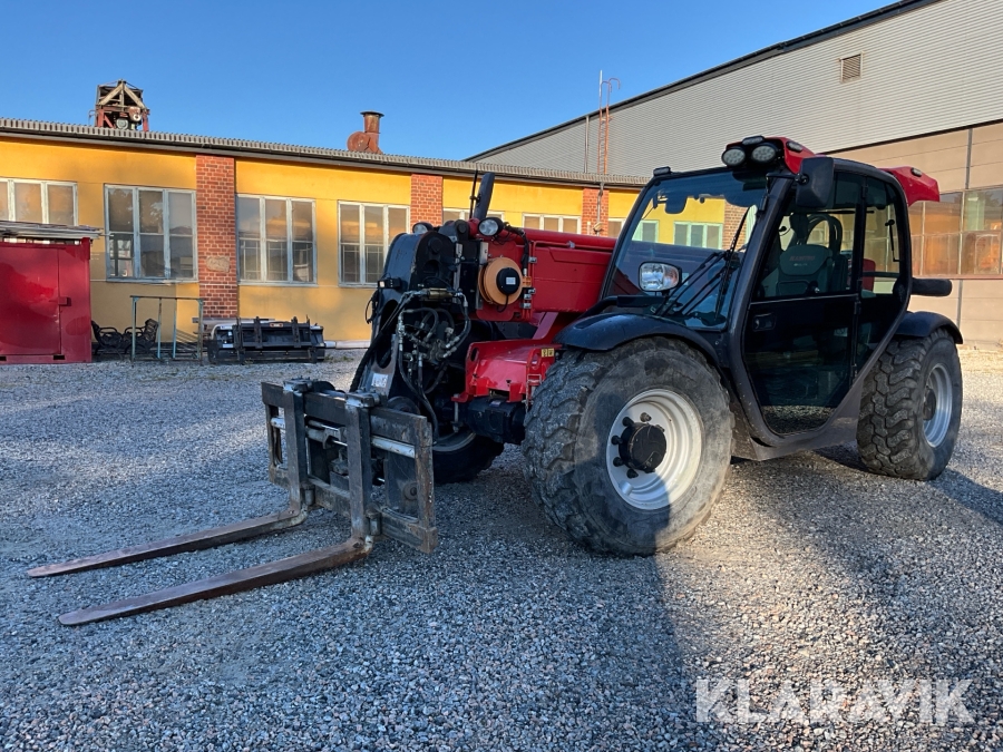 Teleskoplastare  Manitou MVT929 Elite med hydrauliska pallgafflar och planerskopa